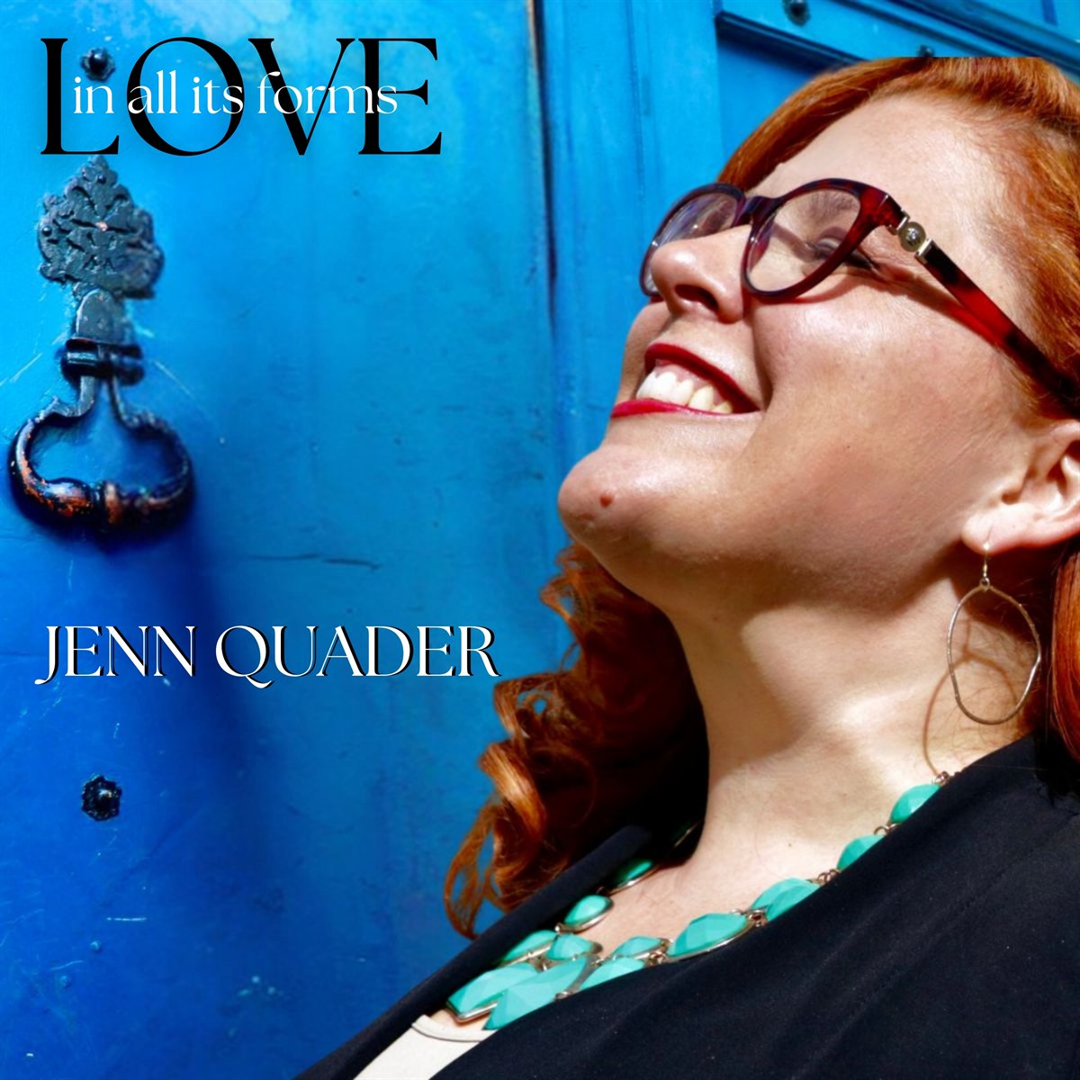 Album cover for Love In All Its Forms: Jenn Quader laughing with her head tilted back against a bright blue wooden door.
