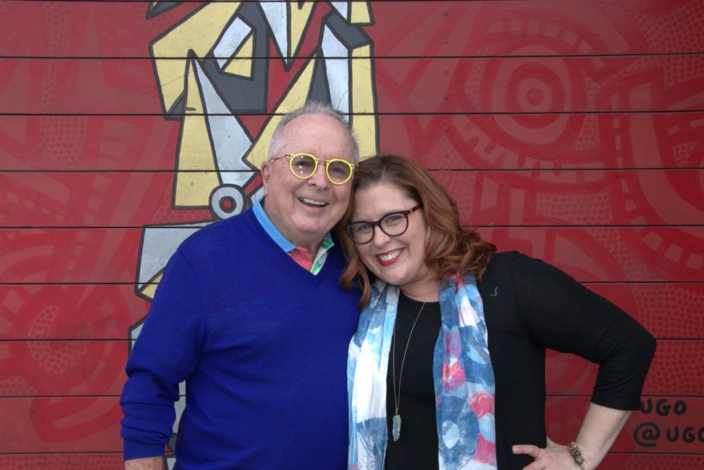 Jenn Quader and her father Dr. Dennis Michels sitting together at the piano during the album sessions.